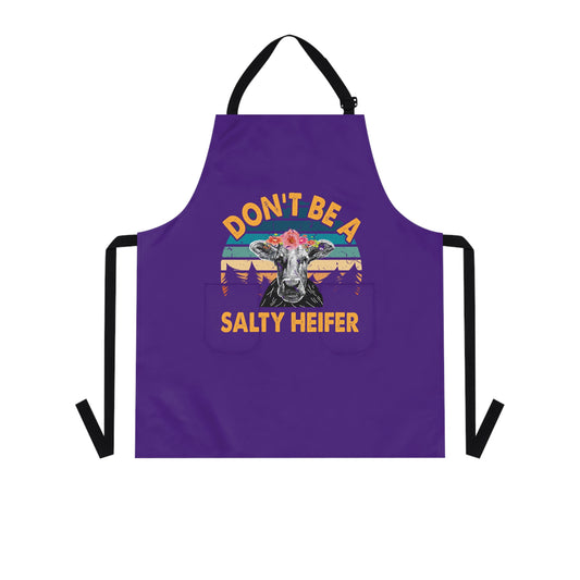 dark purple apron with "dont be a salty heifer" on it