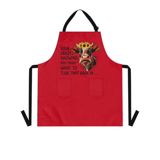 red apron with black straps with "your crazy is showing you might want to tuck that back in....."