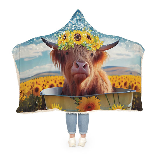 Highland cow with sunflowers