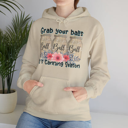 women wearing Grab Your Balls hoodie in beige