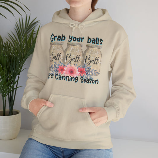 women wearing Grab Your Balls hoodie in beige