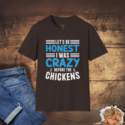 Brown t-shirt with humorous text design on a wooden background with jeans and chickens.